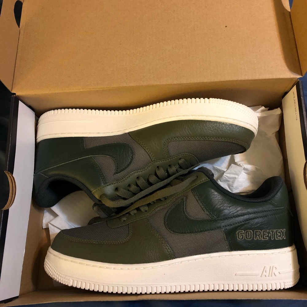 pair of Nike Air Force 1 Lows (Gore-Text material). Baroque Brown / Seal Brown